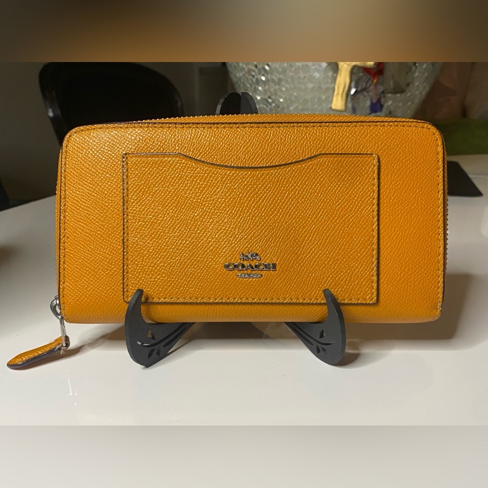 Coach burnt orange Leather long Zip Wallet
